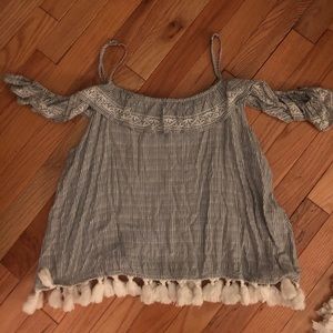Aero cold shoulder tassel top